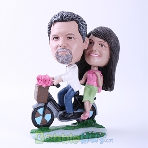 Picture of Couple Riding A Bike Bobblehead