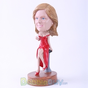 Picture of Red Dressed Woman on Stool Bobblehead