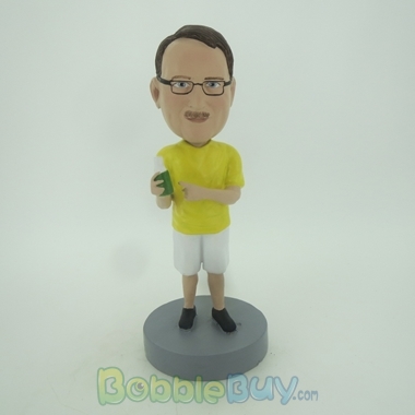 Picture of Casual Man In Yellow Having Drink Bobblehead